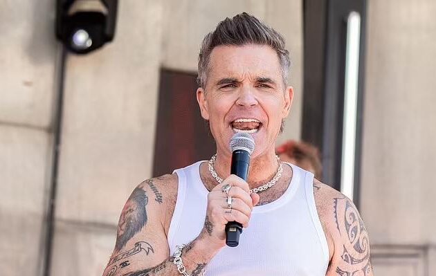 Robbie Williams donates to charity after raking in £75.2M