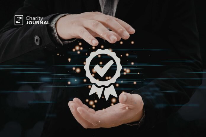 Verification badge displayed above an open hand