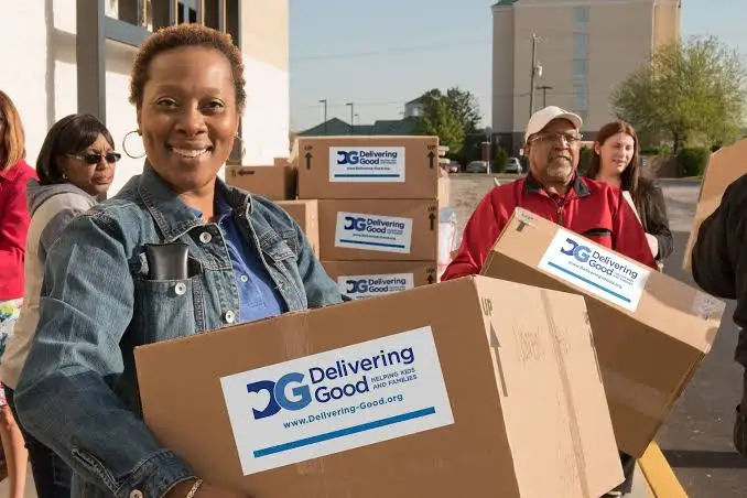 Woman holding Delivering Good care packages