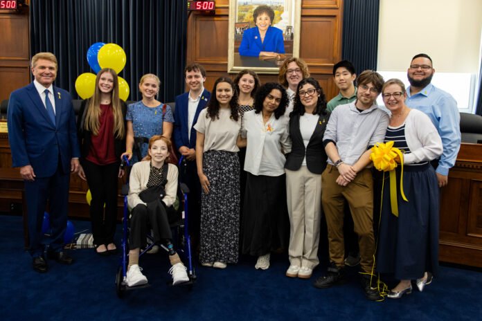 Rep McCaul, Mikaela Naylon and members of MIB Agents Junior Advisory Board