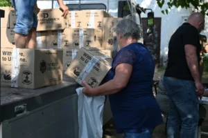 Bird of Light Foundation care packages loaded on a truck