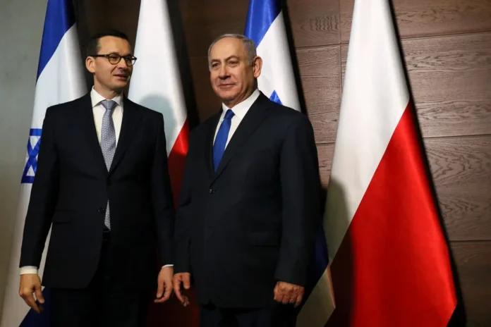 Prime Minister Benjamin Netanyahu of Israel, right, with former Prime Minister Mateusz Morawiecki of Poland