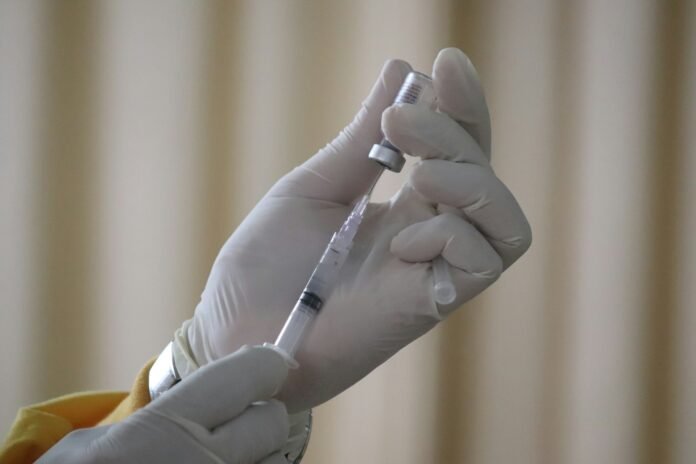 vaccine in human hand amid PIVI study
