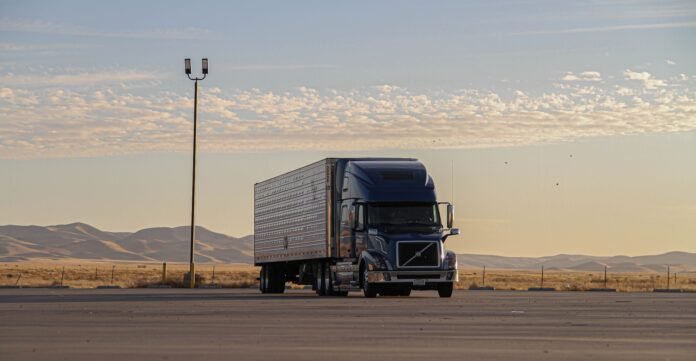 Electric truck leaning on ChargeHub