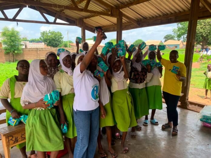 Blessed Care International donating pads to girls in Ghana